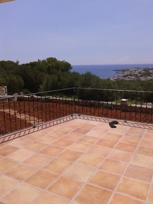 pavimento esterno in pietra rossa