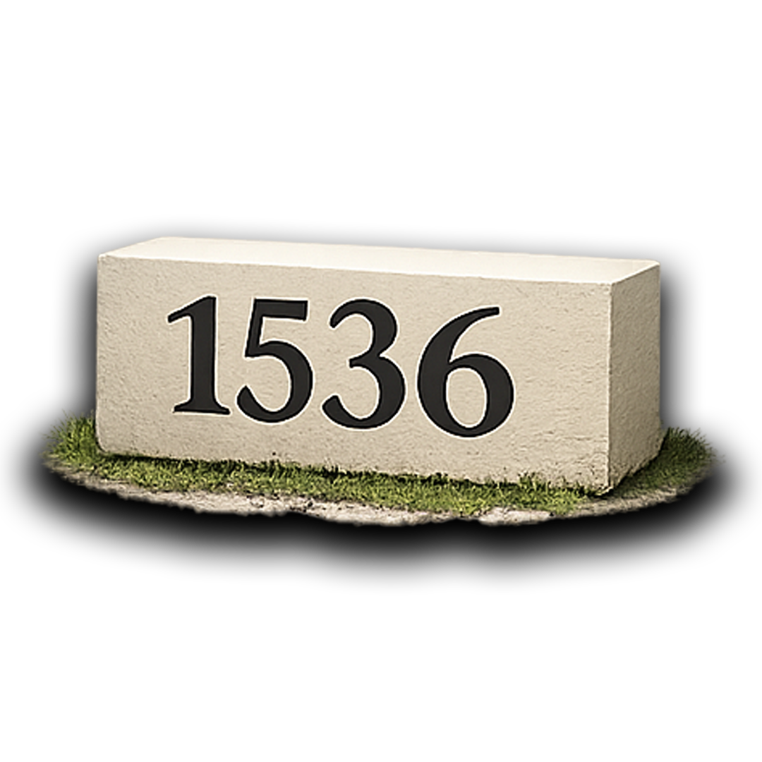 Beige stone house number marker with black numbers 
