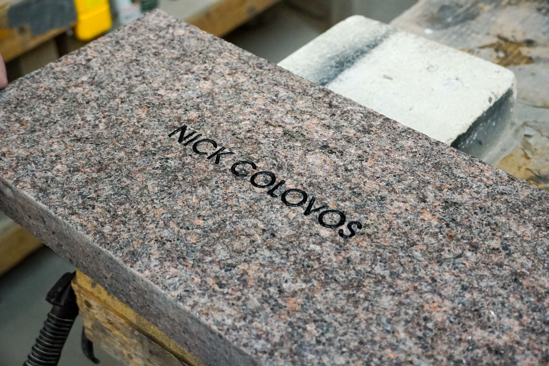 Granite slab with etched text 