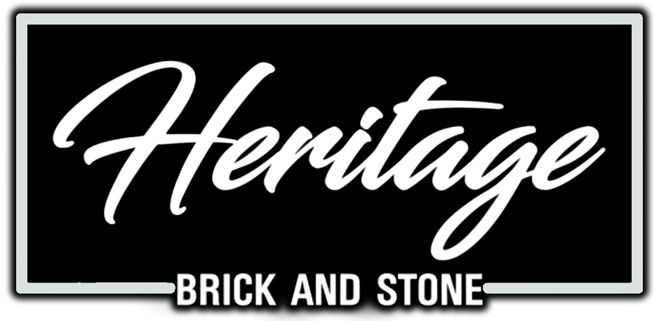 Logo for Heritage Brick and Stone, white script text on a black rectangle, bordered by a white and gray outline.