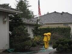 Walkway Power Washing — Man Cleaning the Walkway with Pressured Water in Damascus, OR