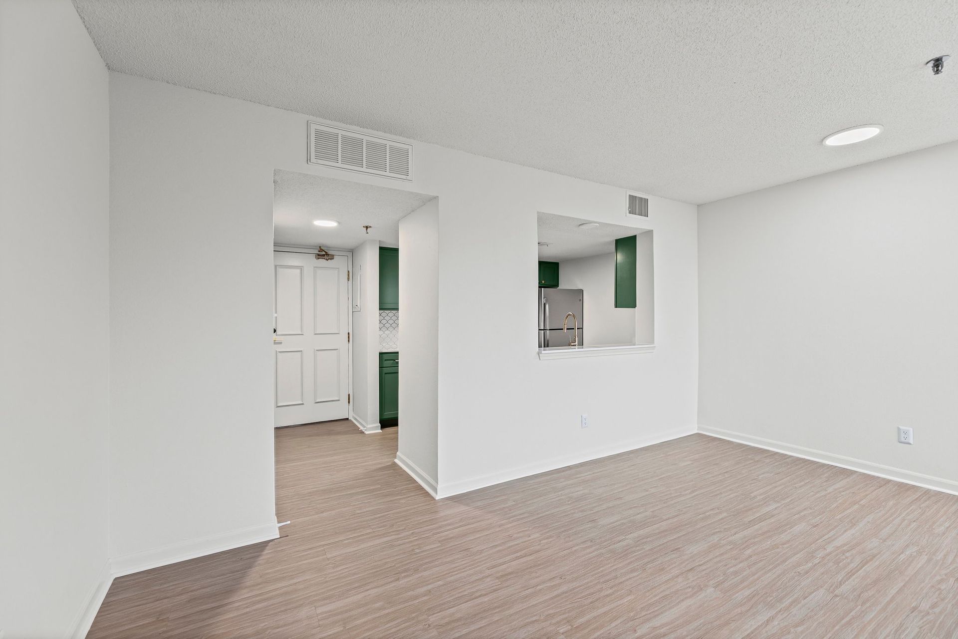 Renovated apartment highlighting modern textures and tones