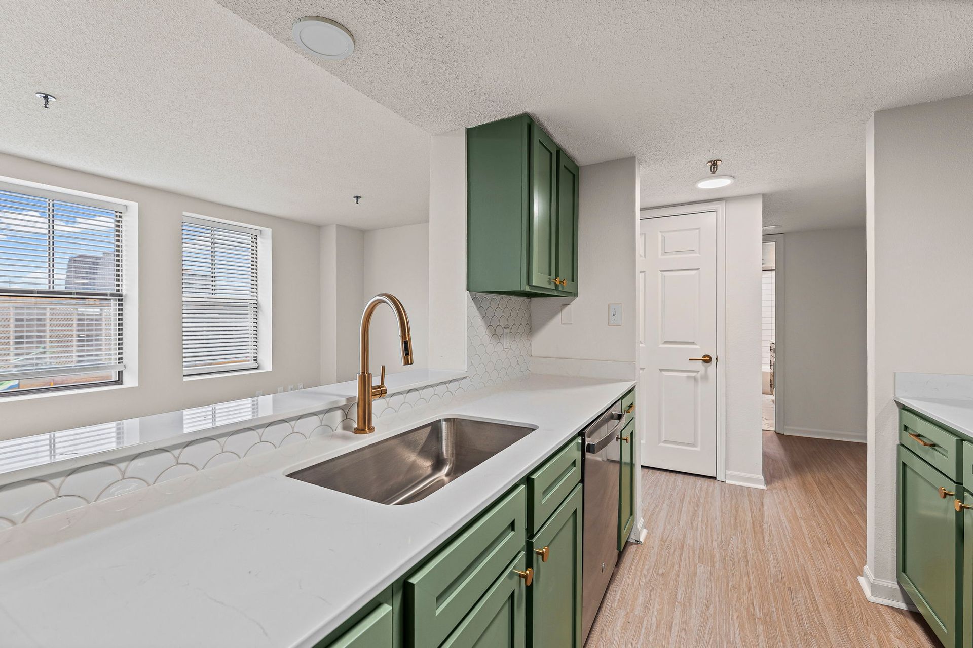 Sleek renovated kitchen at The Majestic on the Plaza