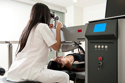 a woman undergoing ophthamology test