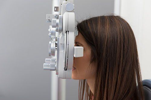 A woman being treated by an ophthalmologist in Clarksville, TN