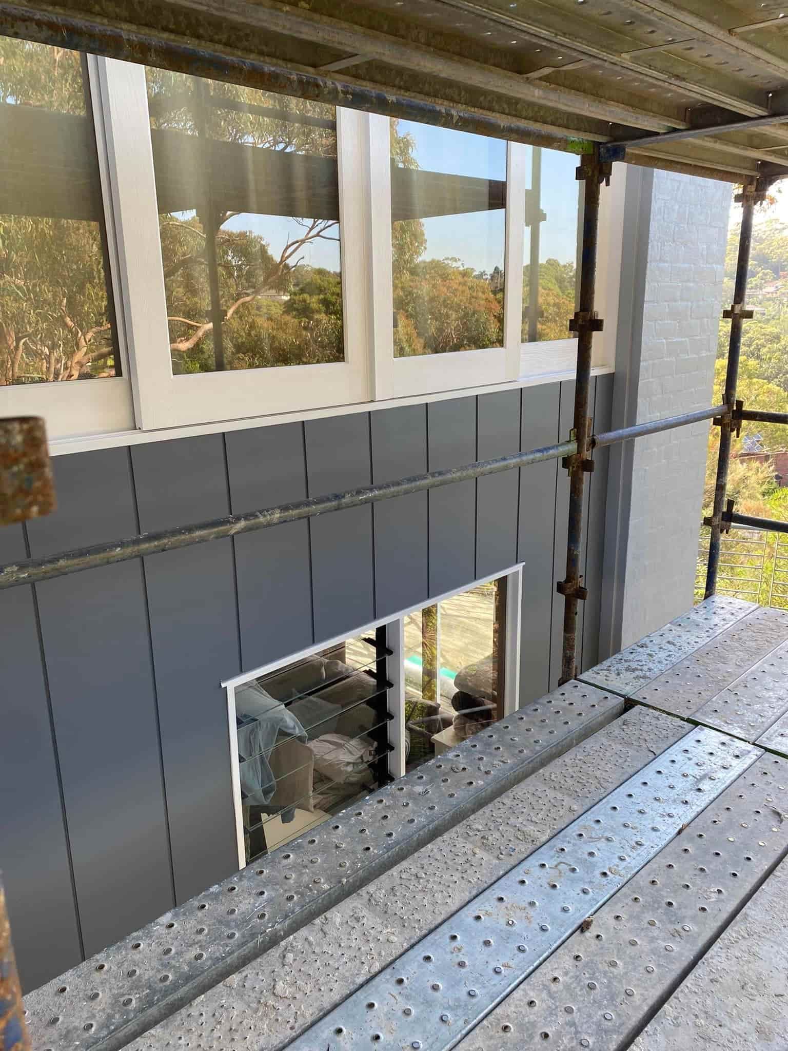 Building Exterior Under Construction With Gray Siding — S D Maintenance In Kincumber, NSW