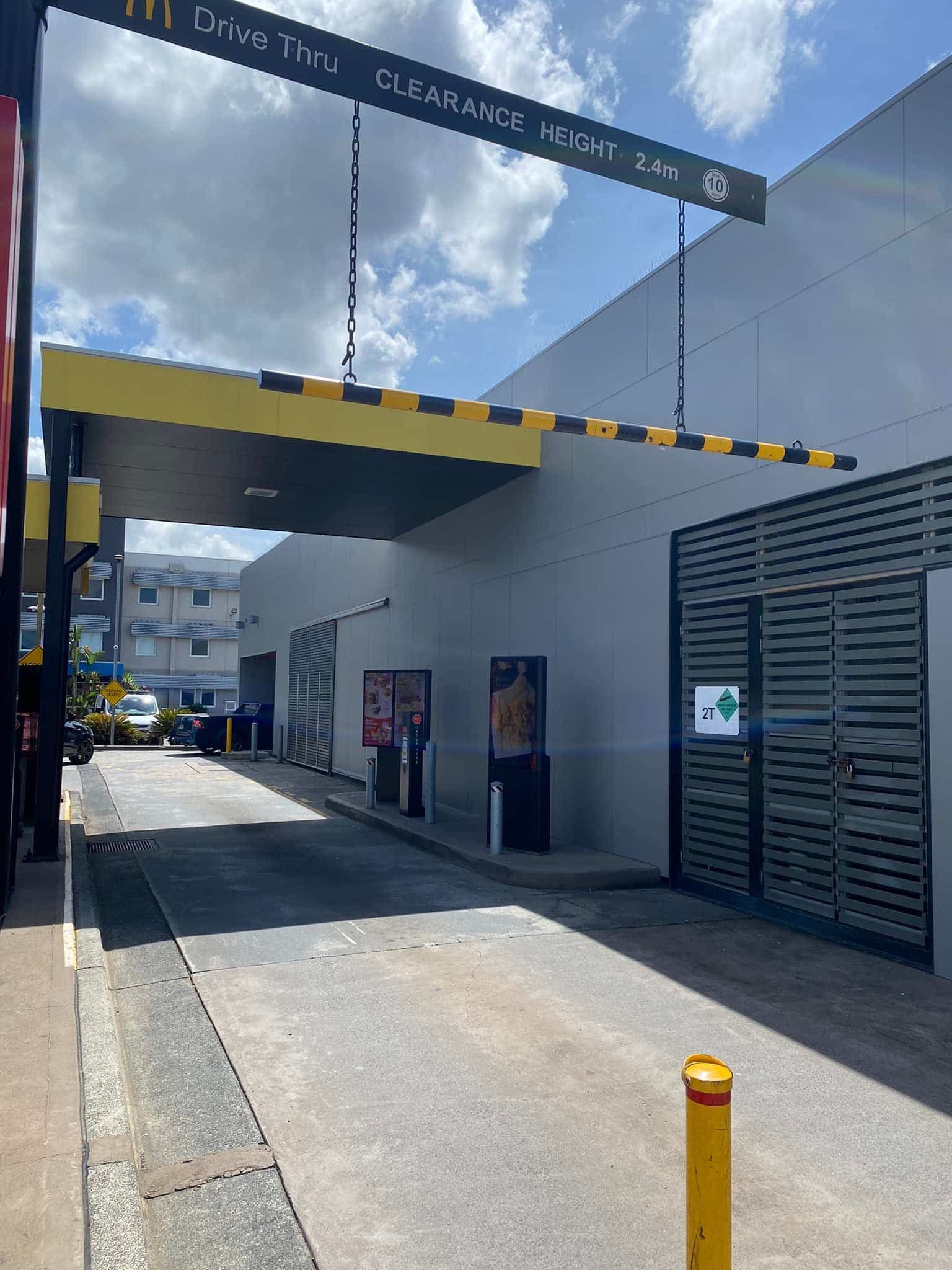 McDonald's Drive-thru With a Yellow and Black Clearance Bar — S D Maintenance In Erina, NSW