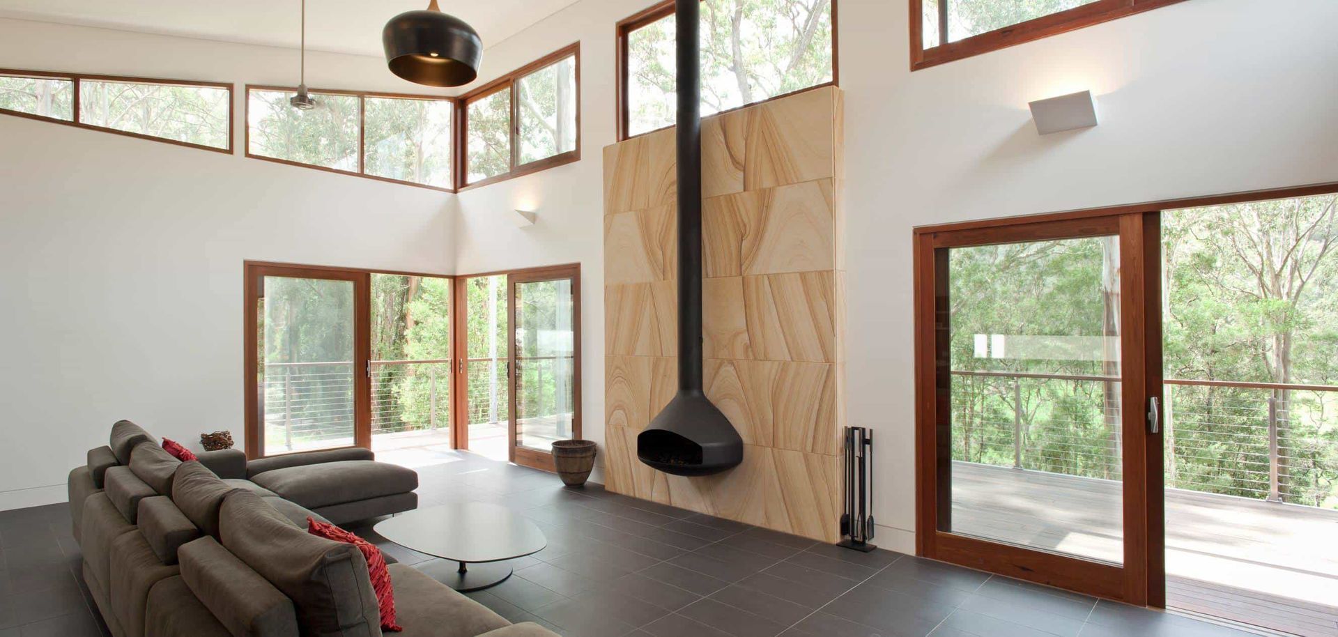 Modern Living Room With a Suspended Fireplace and Large Windows — S D Maintenance In Erina, NSW