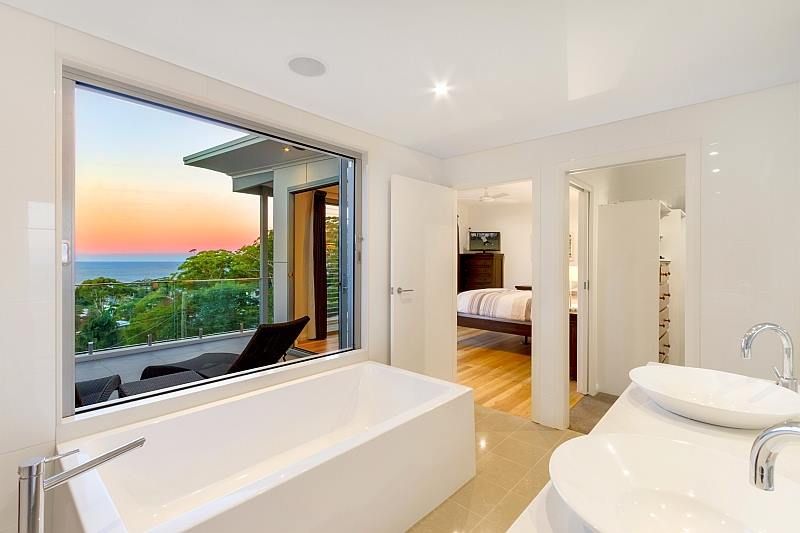 Modern White Bathroom With Ocean View, Bathtub, and Sinks — S D Maintenance In Terrigal, NSW