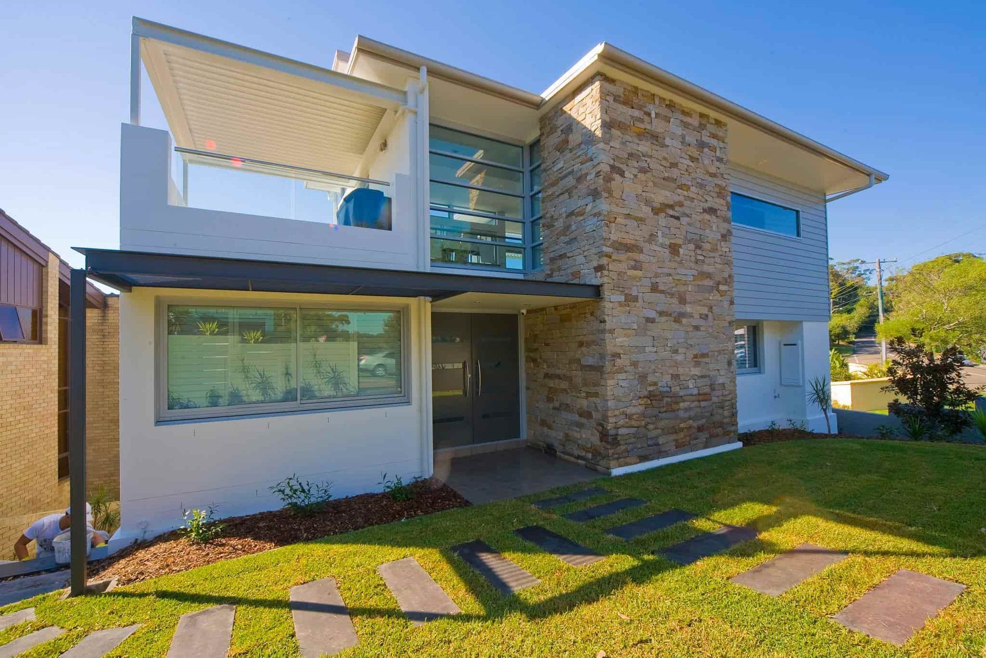 Modern Two-story House With Stone and White Facade — S D Maintenance In Bateau Bay, NSW