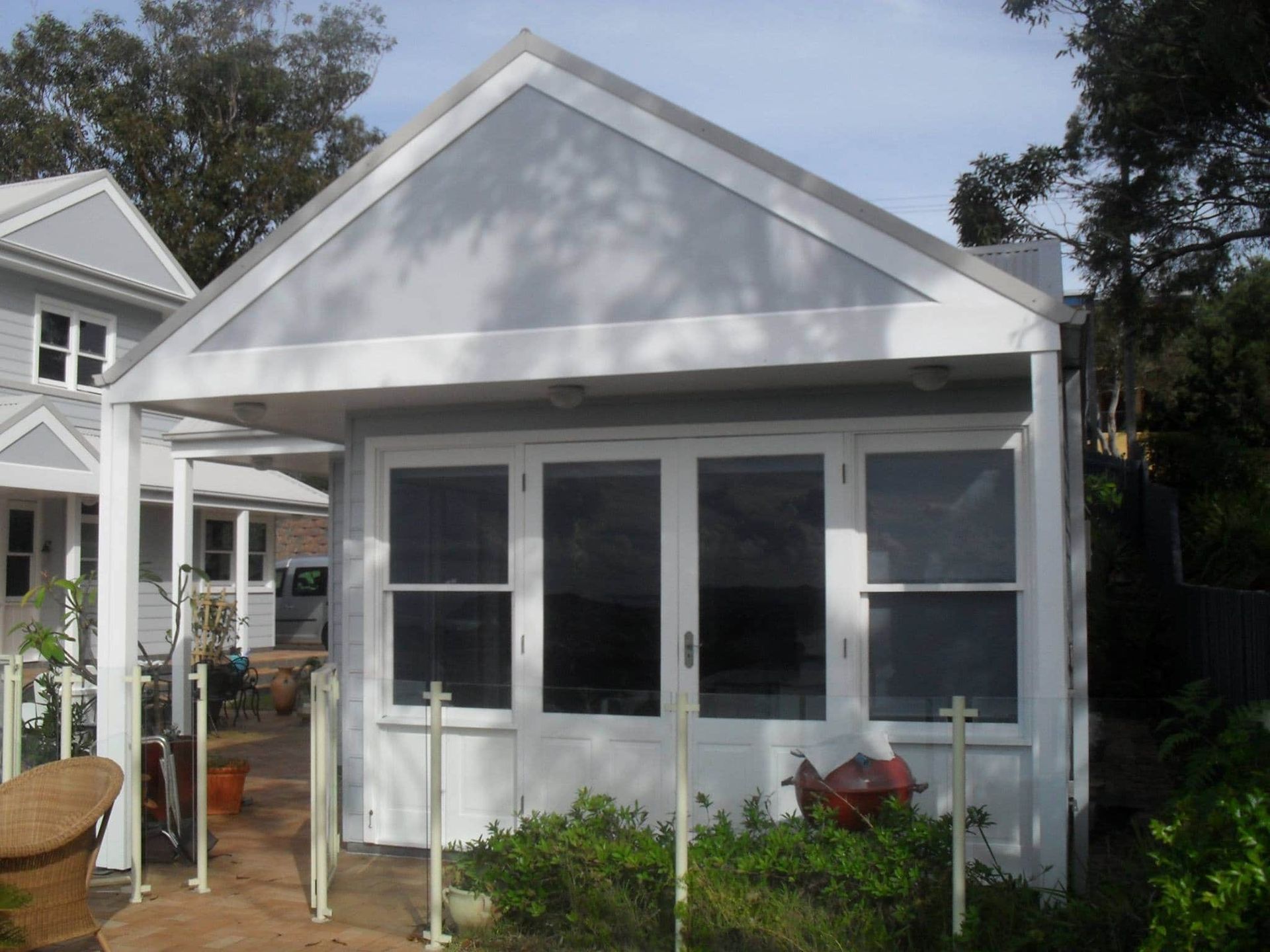 White Building With Glass Doors and Windows — S D Maintenance In Avoca, NSW