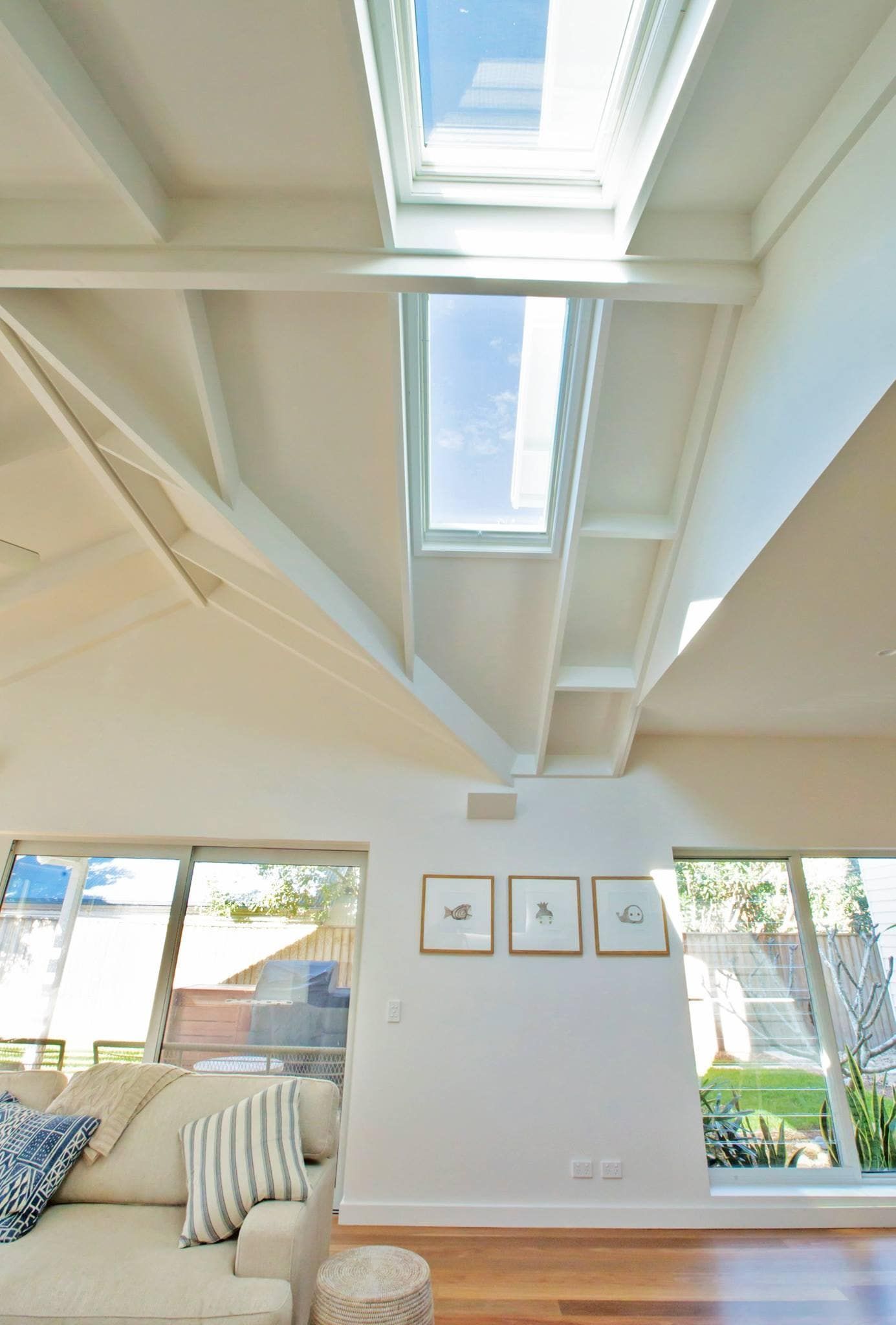 Living Room With High White Ceiling, Skylights, and Large Windows — S D Maintenance In Point Clare, NSW