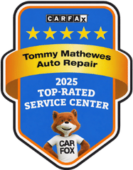 A blue Carfax 2025 Top-Rated Service Center award badge for Tommy Mathewes Auto Repair