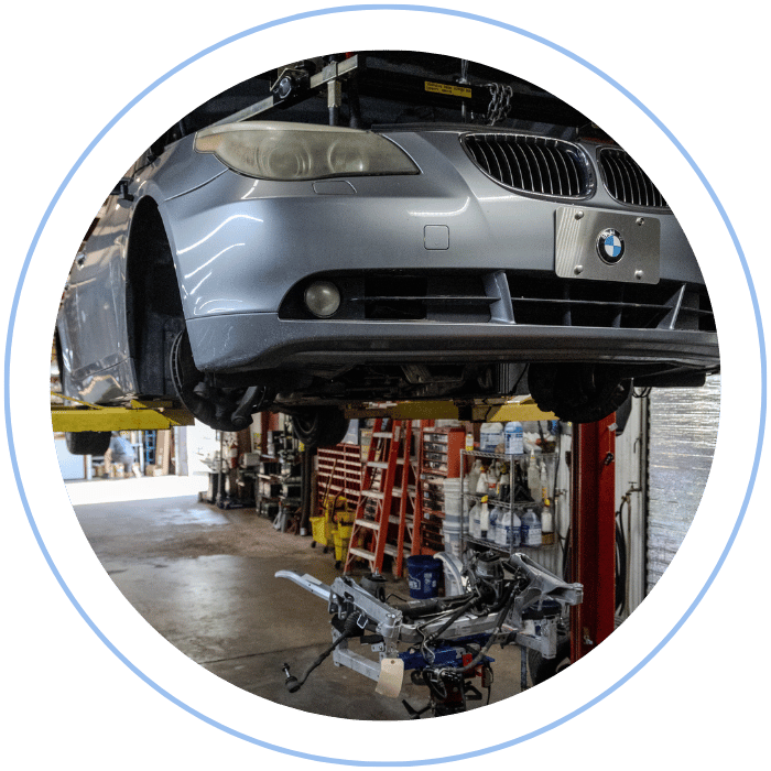 Brake service with vehicle elevated in repair bay