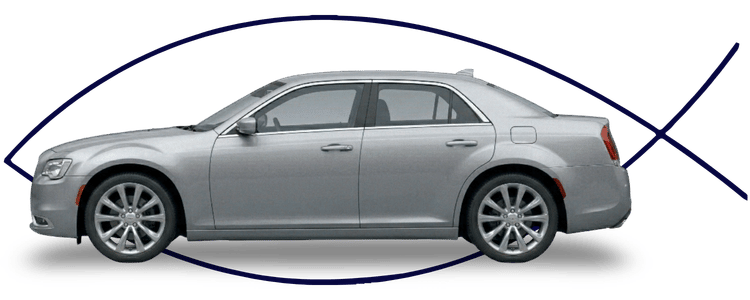 Blue car-shaped keychains displayed on the front desk, with a BMW mug and a Christian fish symbol sign in the background.