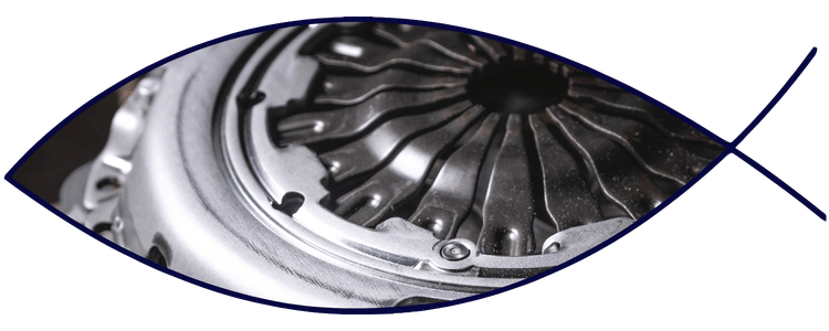 Blue car-shaped keychains displayed on the front desk, with a BMW mug and a Christian fish symbol sign in the background.