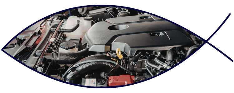 Blue car-shaped keychains displayed on the front desk, with a BMW mug and a Christian fish symbol sign in the background.