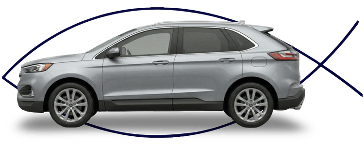 Blue car-shaped keychains displayed on the front desk, with a BMW mug and a Christian fish symbol sign in the background.