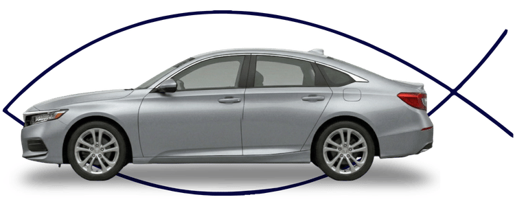 Blue car-shaped keychains displayed on the front desk, with a BMW mug and a Christian fish symbol sign in the background.