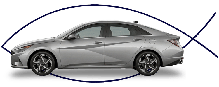 Blue car-shaped keychains displayed on the front desk, with a BMW mug and a Christian fish symbol sign in the background.