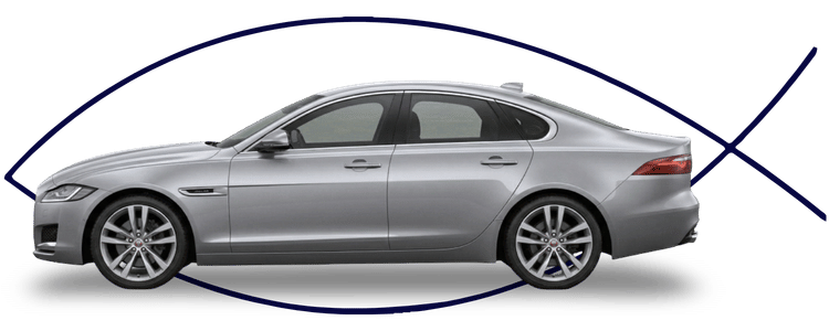 Blue car-shaped keychains displayed on the front desk, with a BMW mug and a Christian fish symbol sign in the background.