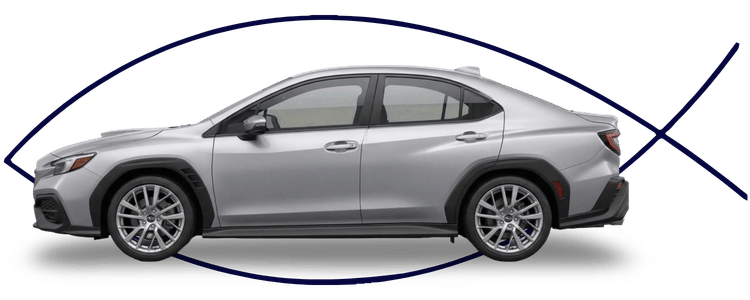 Blue car-shaped keychains displayed on the front desk, with a BMW mug and a Christian fish symbol sign in the background.