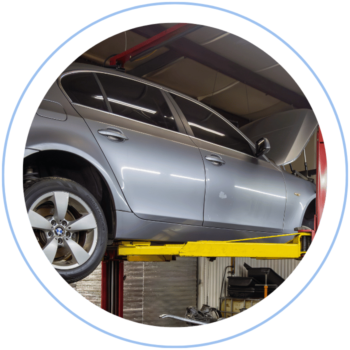 Suspension and steering inspection on lifted vehicle