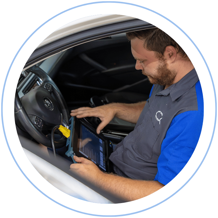 Transmission service with vehicle elevated in shop