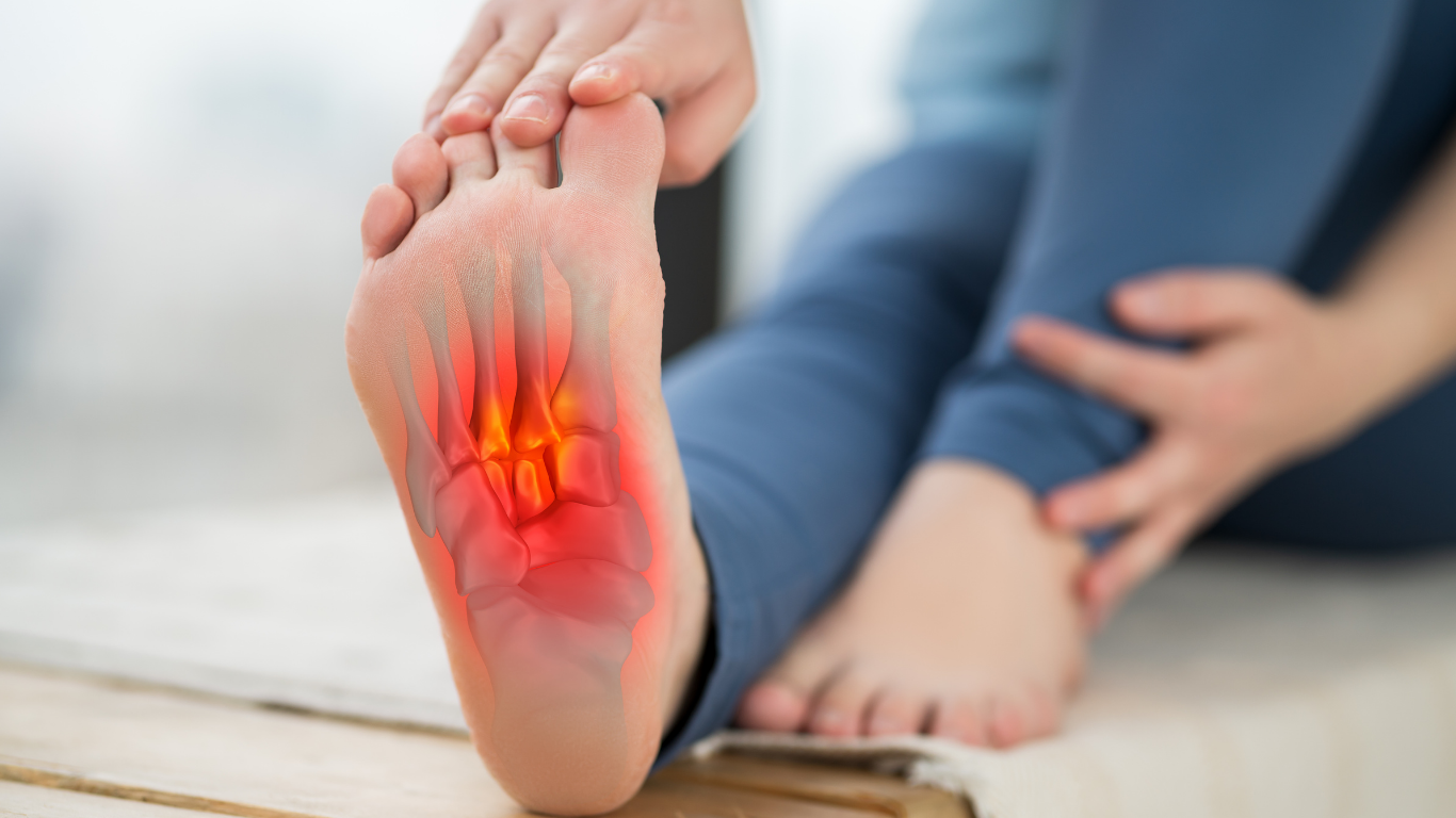 A woman is getting her toenails done by a dentist.