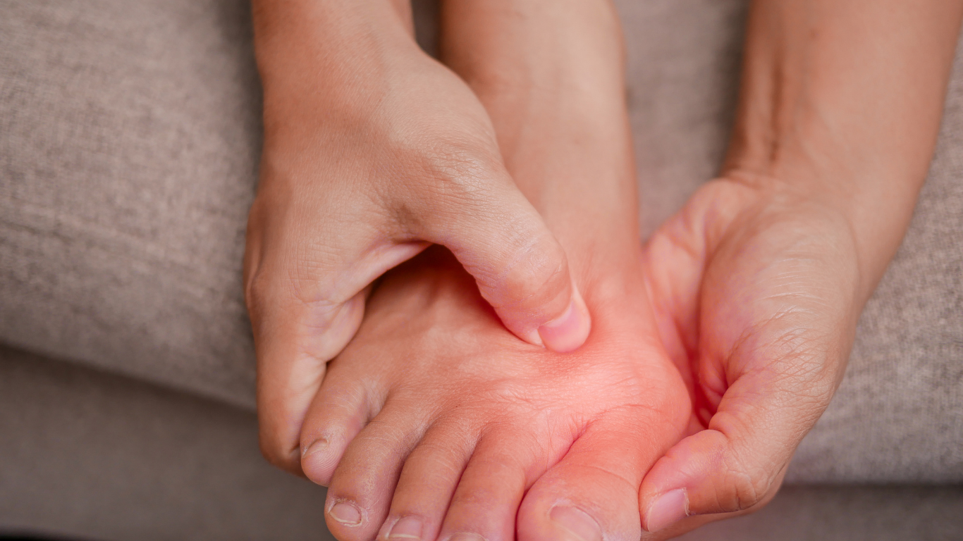 A woman is getting a foot massage at a spa.