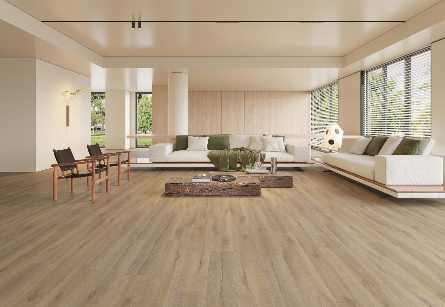 Modern, spacious living room with light wood flooring, white sofas, neutral cushions, and low wooden coffee tables.