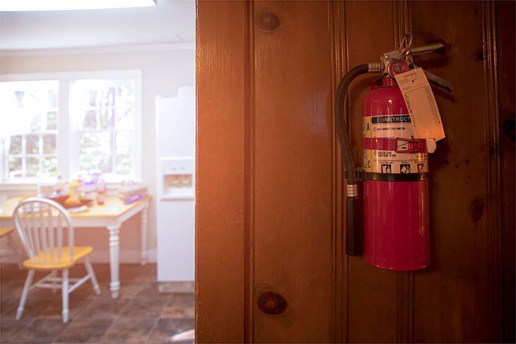 Fire Extinguisher Installation In The Kitchen On The Sunshine Coast