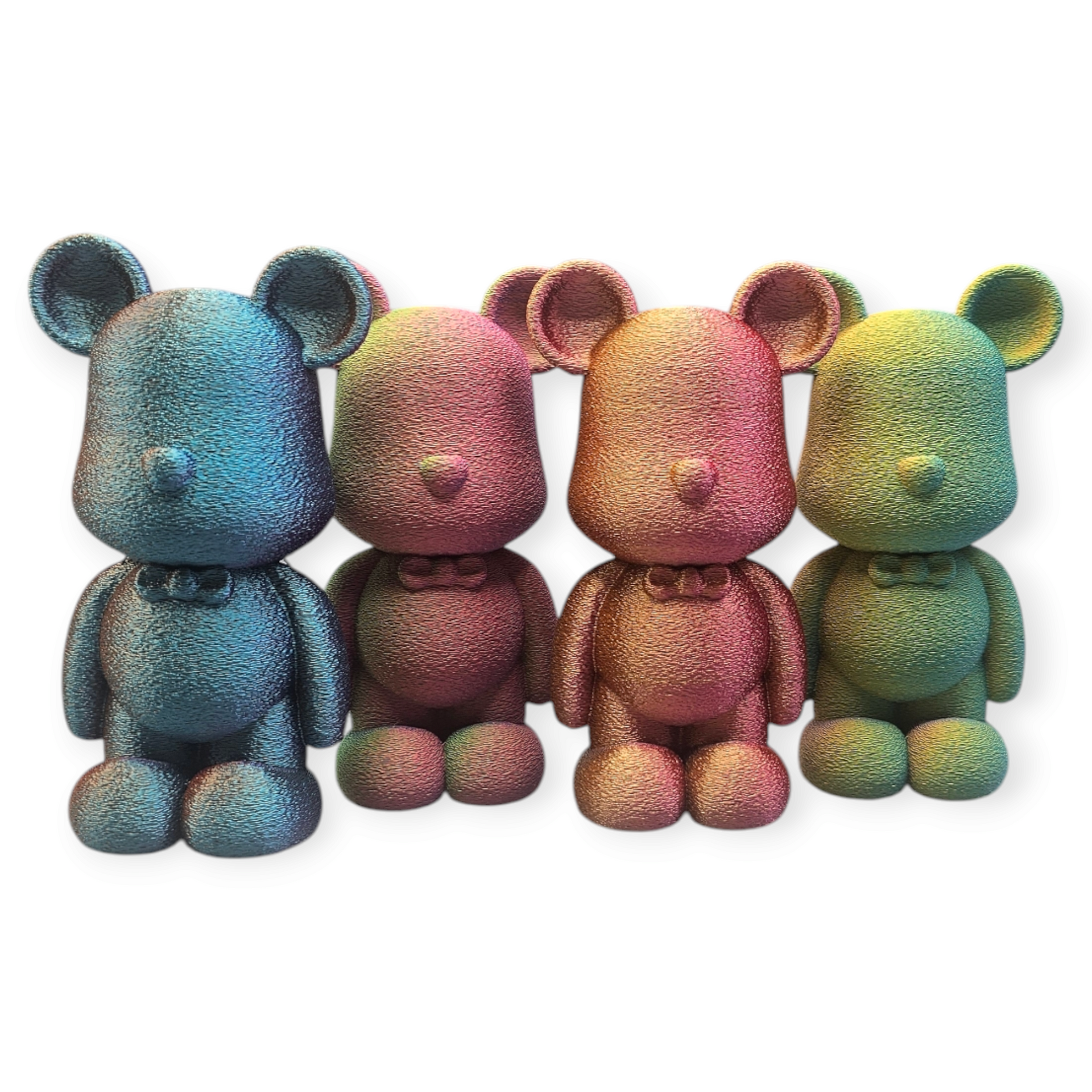 Vier glinsterende beervormige beeldjes in de kleuren blauw, rood, goud en groen.