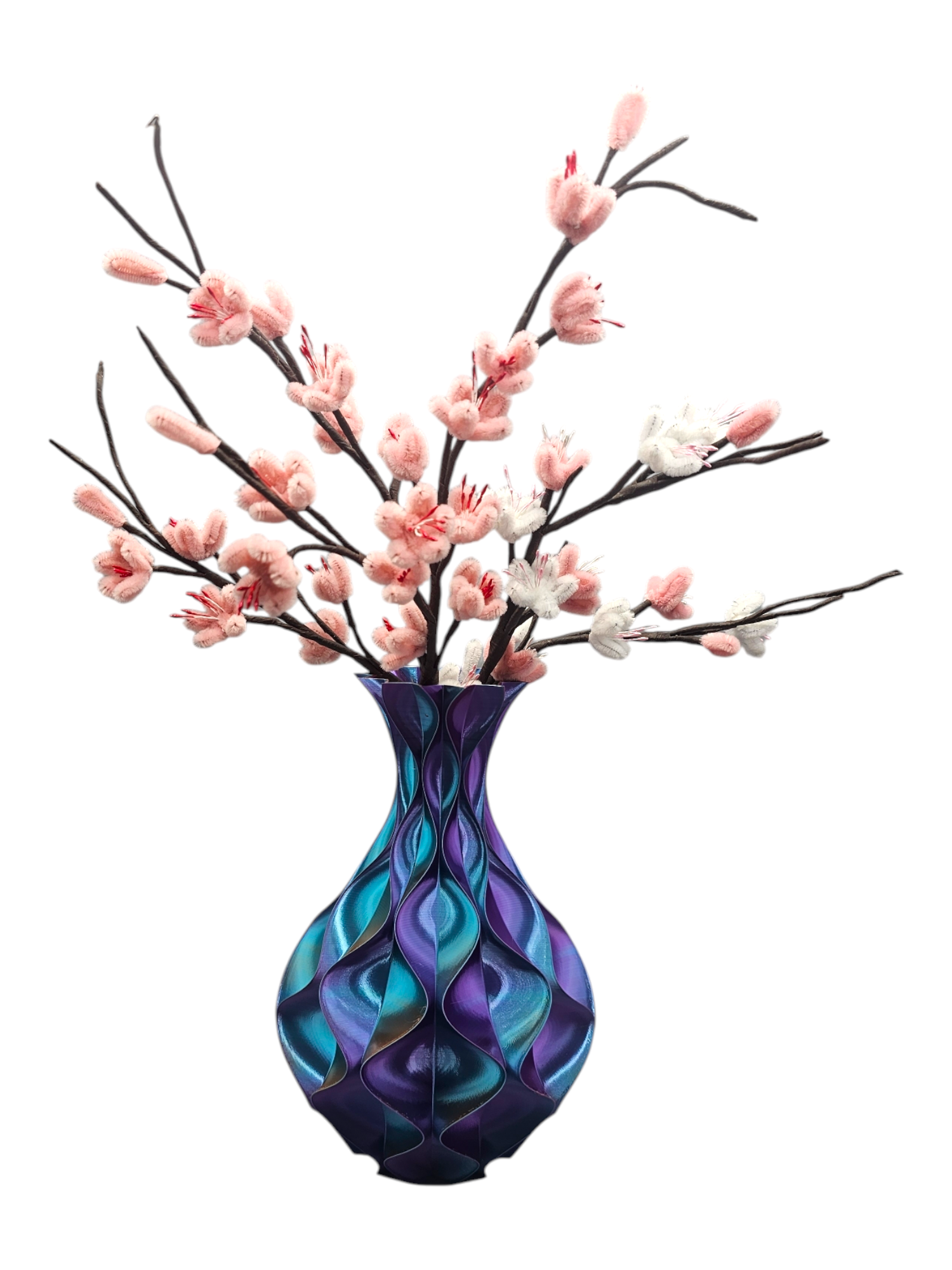 Drie decoratieve vazen in verschillende kleuren. Links boven: roze, oranje en paars. Rechts boven: goud en oranje. Rechts onder: roze.