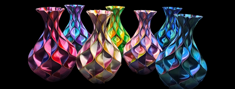 Colorful, patterned vases arranged on a black background.