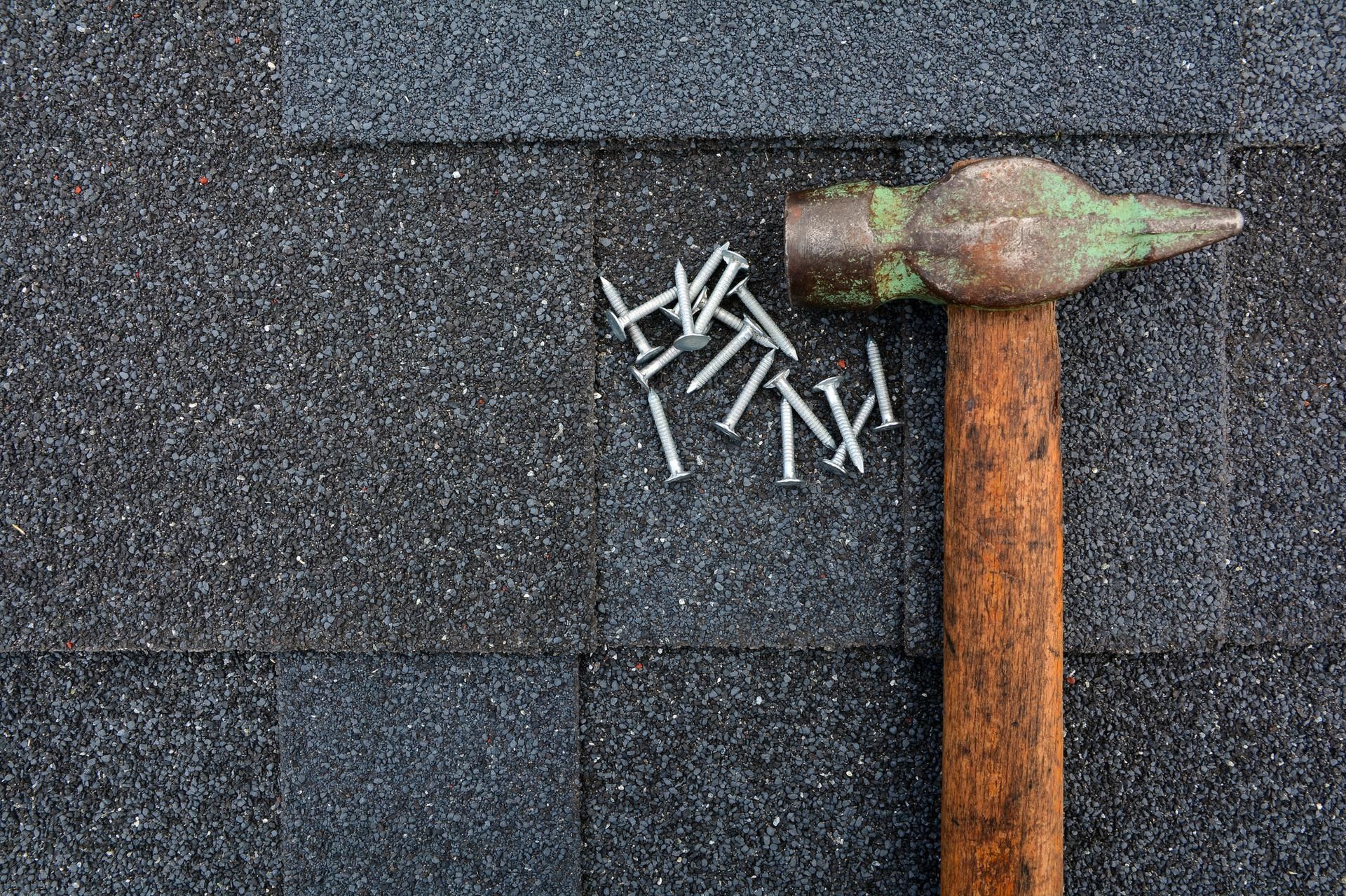 Hammer And Nails On The Roof — Glen Allen, VA — DeShazo And Son Roofing Inc