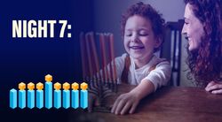 A child getting candles ready to light