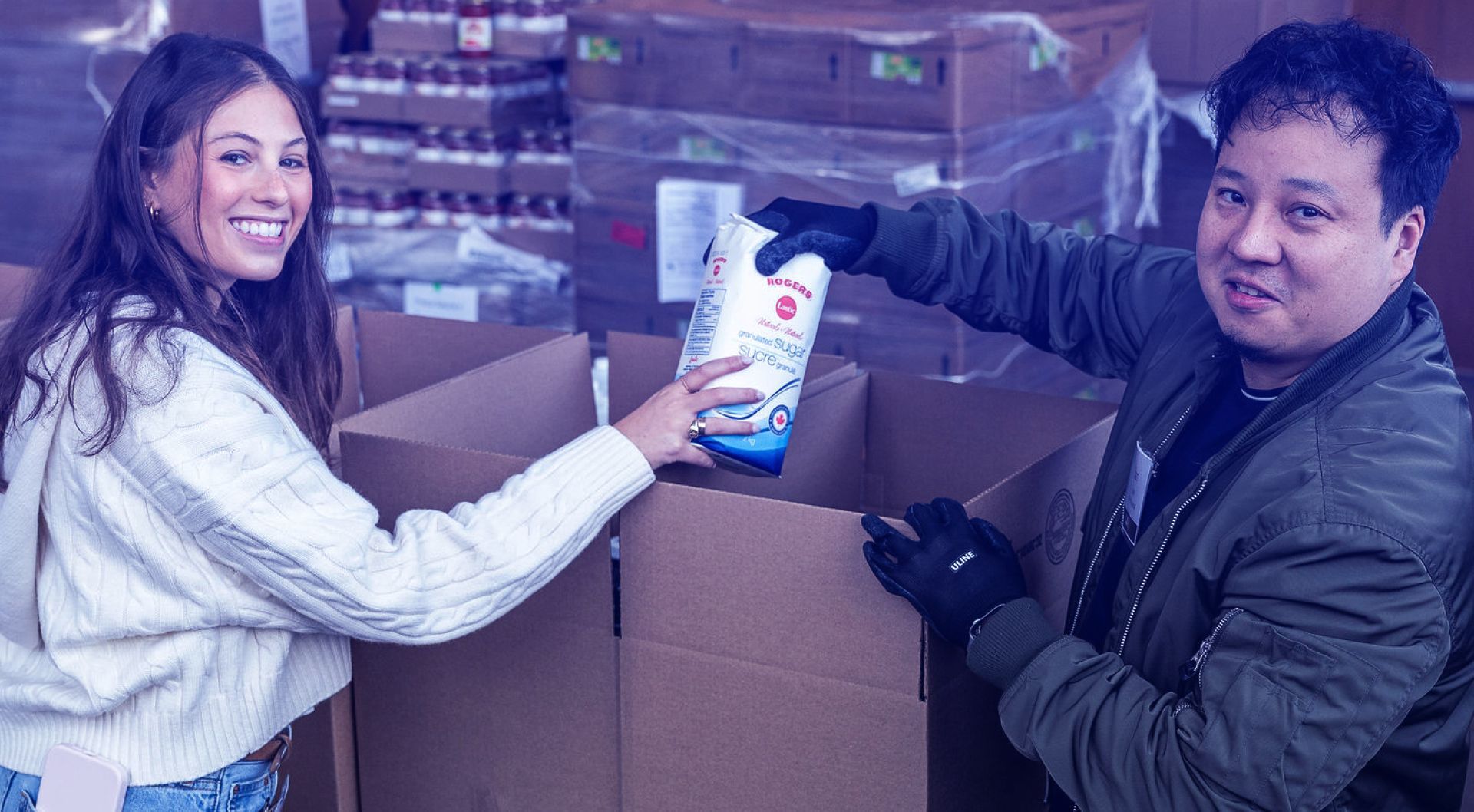 A volunteer delivering groceries
