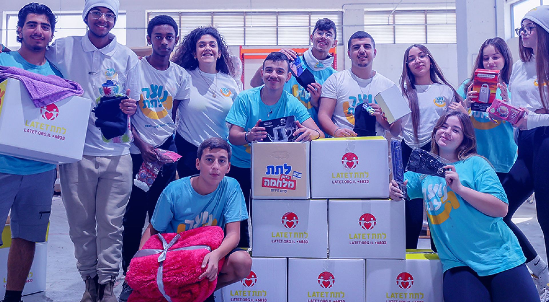 Volunteers packing aid boxes