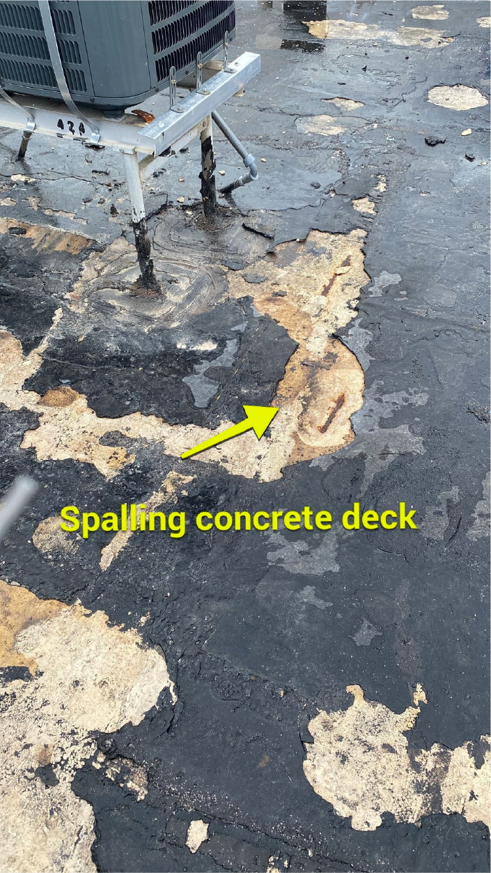 A concrete deck with a yellow arrow pointing to it.