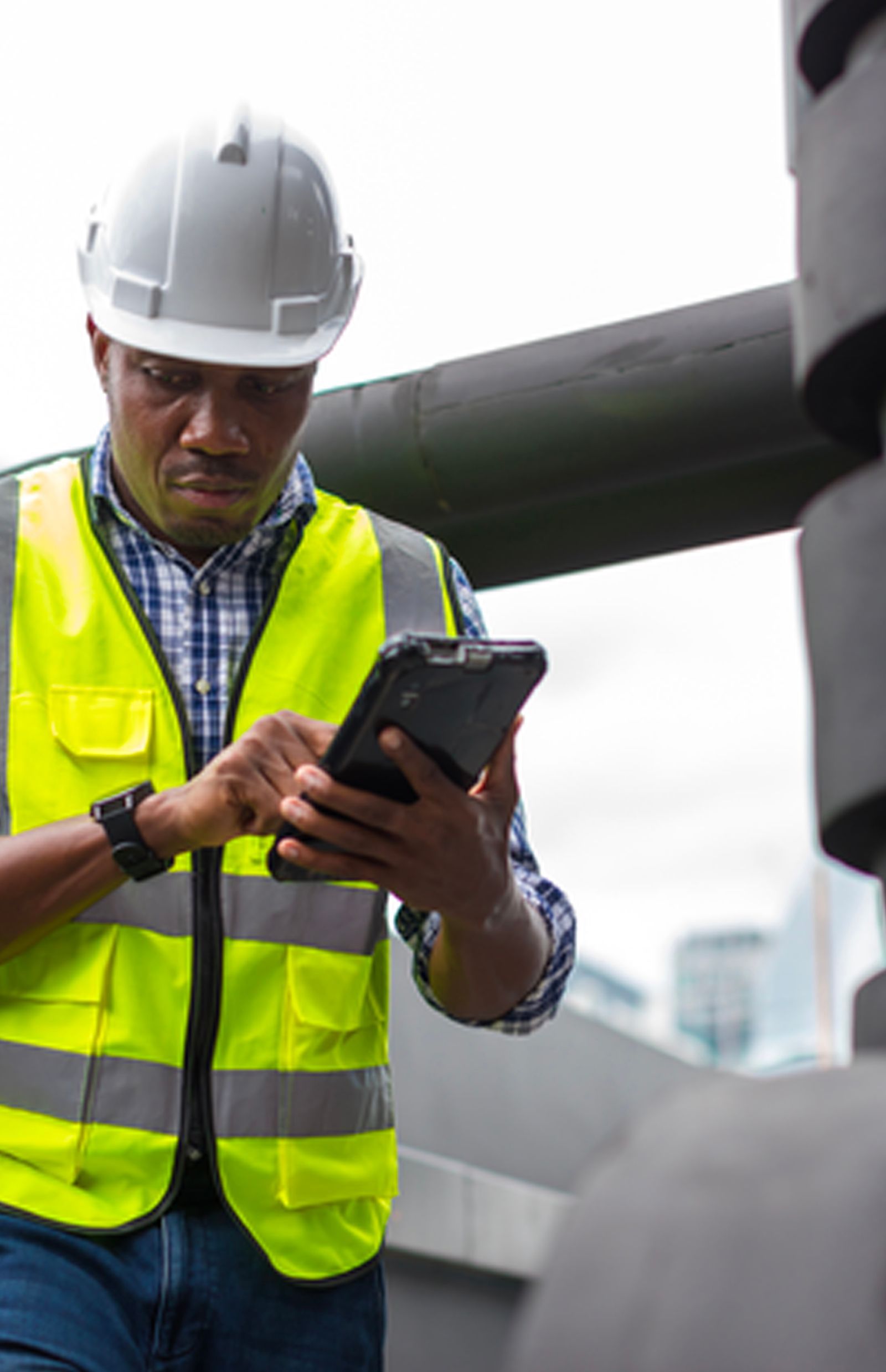 A group of people are working on the roof of a building.