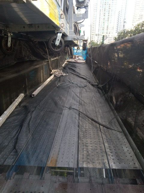 A train is being towed by a tow truck.