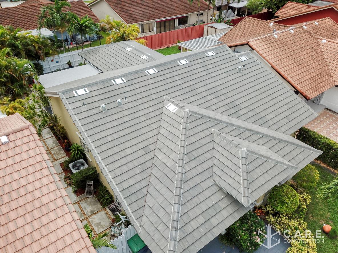 An aerial view of a house with a tiled roof.