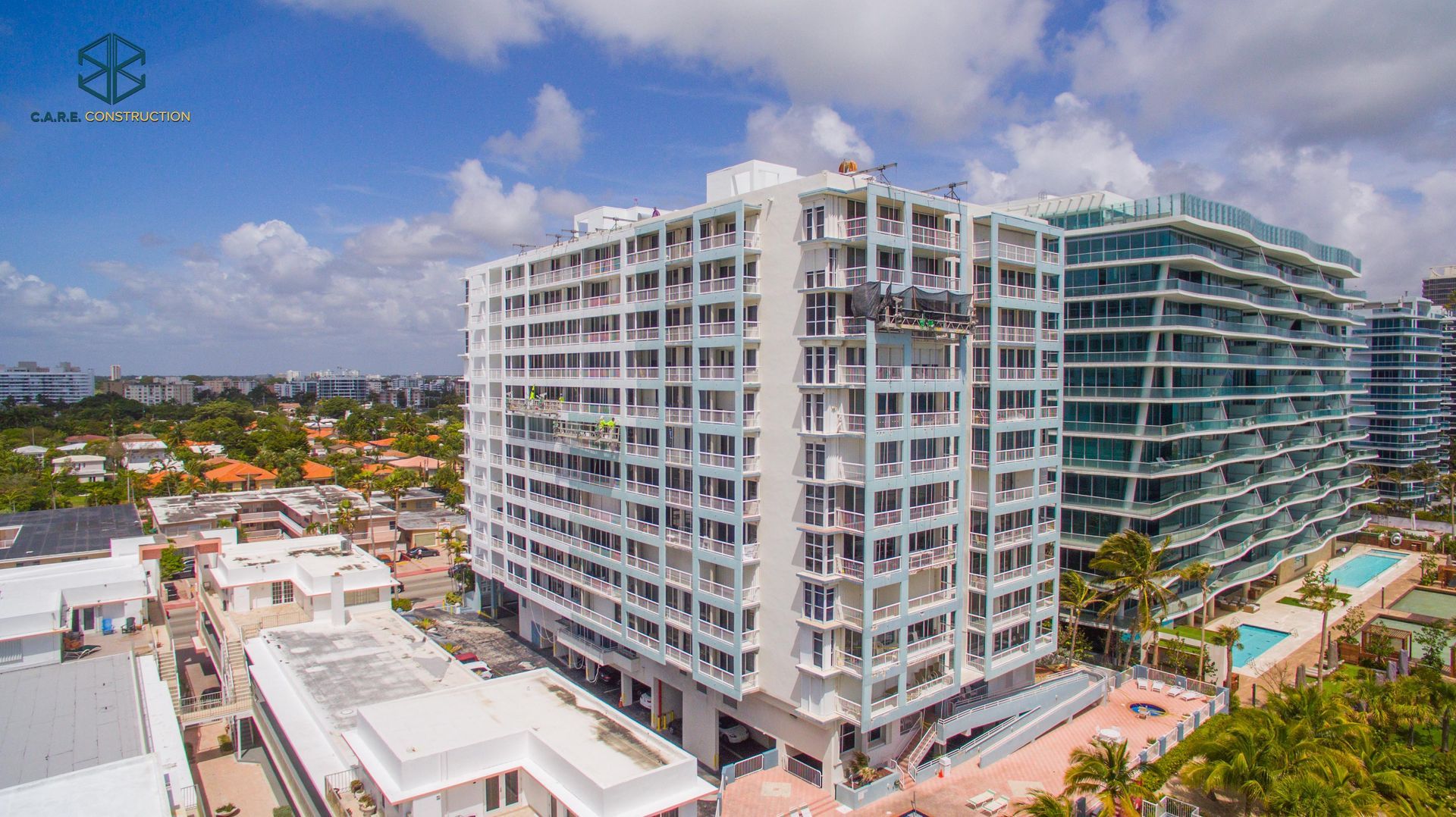 An aerial view of a large building in a city