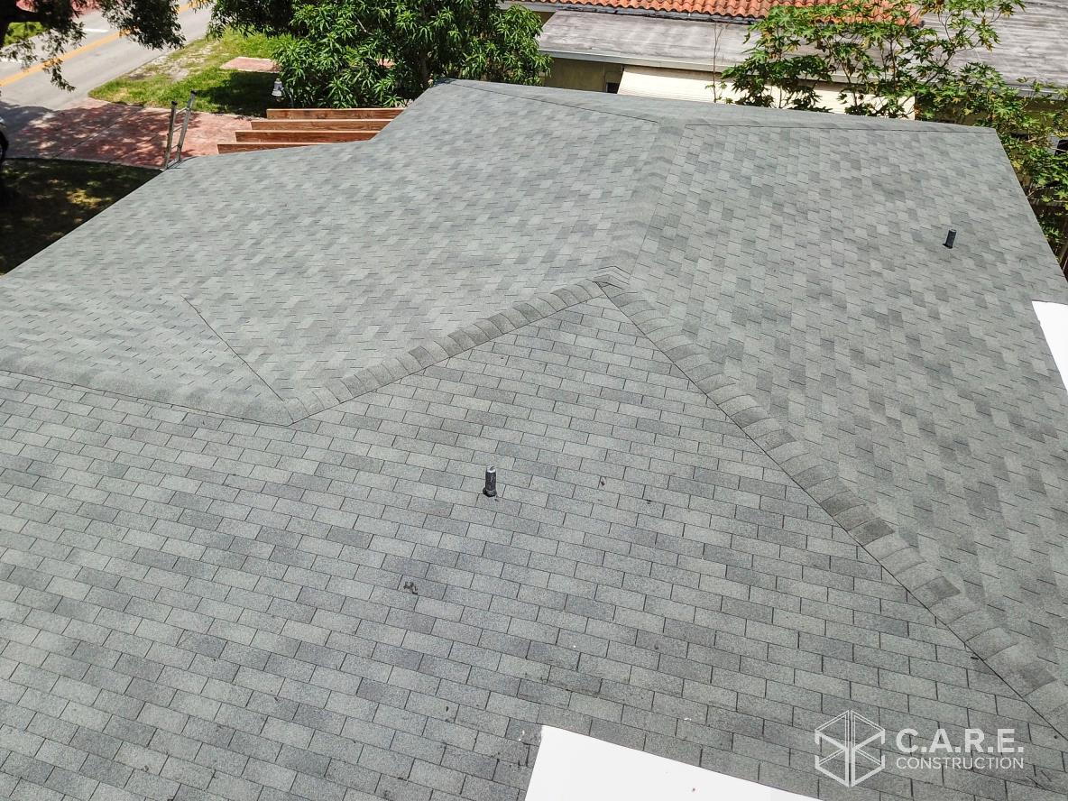 An aerial view of a roof with shingles on it.