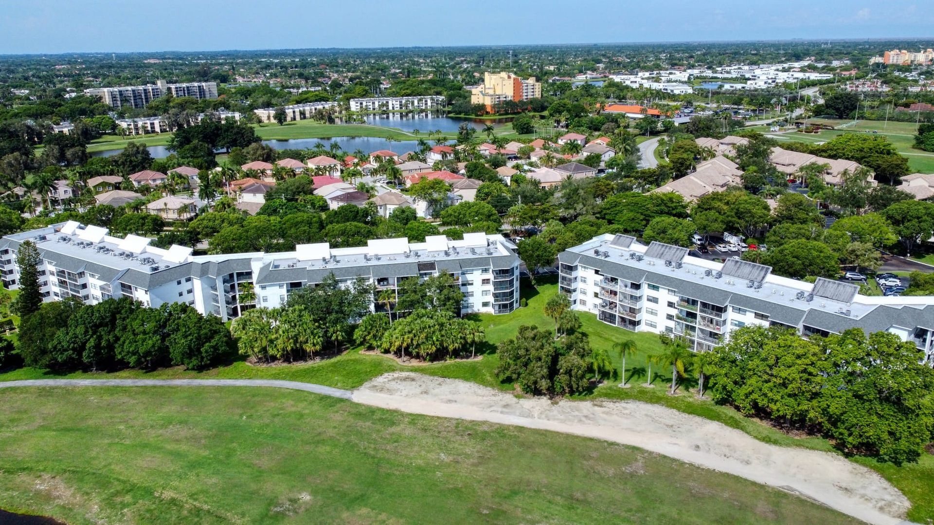 An aerial view of a city with a lot of buildings and trees