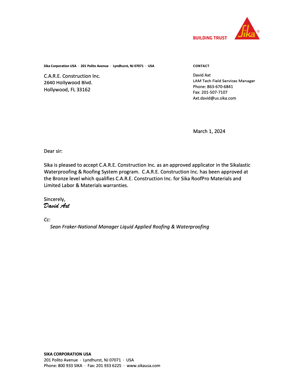 A letter with a red triangle on it is on a white background.