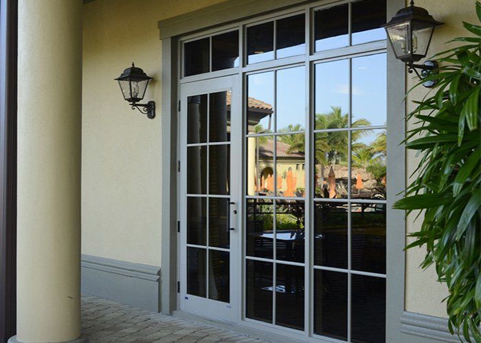 A door with a lot of windows on a building