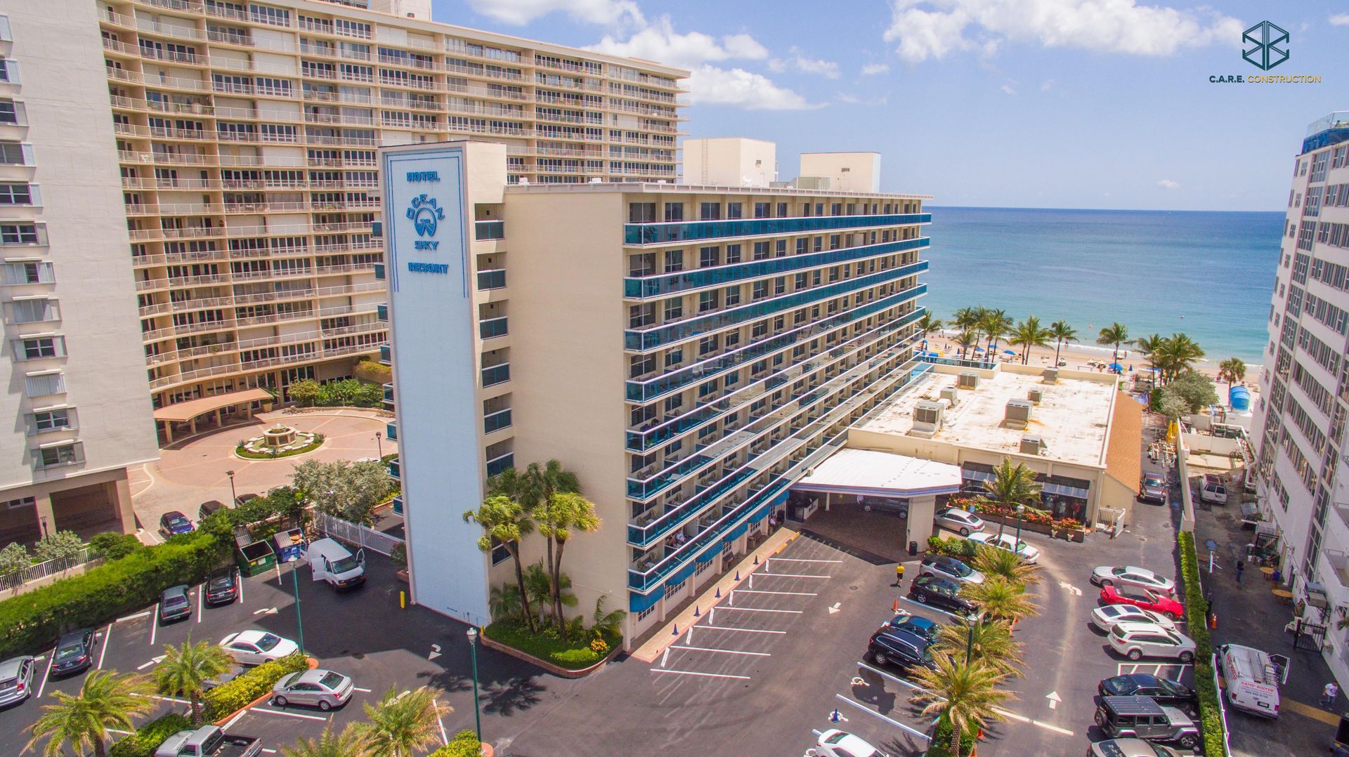 An aerial view of a hotel near the ocean