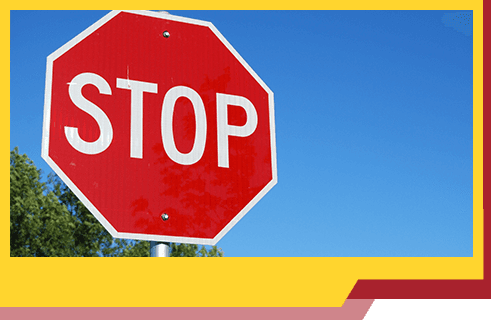 Gill's Garage Currrumbin Services Stop Sign